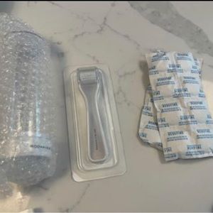Rodan and Fields AMP microneedle Roller